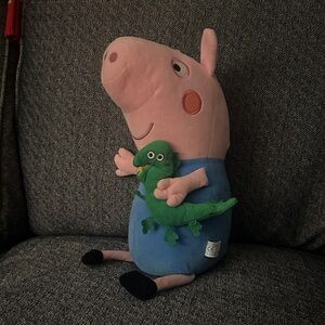 Georgie Pig with his dinosaur